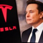 Elon,Musk,,Ceo,Of,Tesla,,In,A,Formal,Suit,With